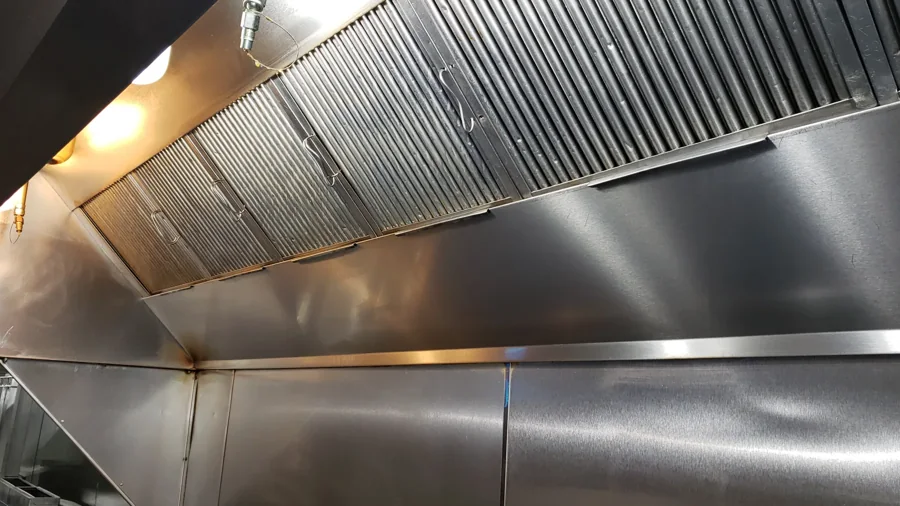 Long row of commercial kitchen hood filters