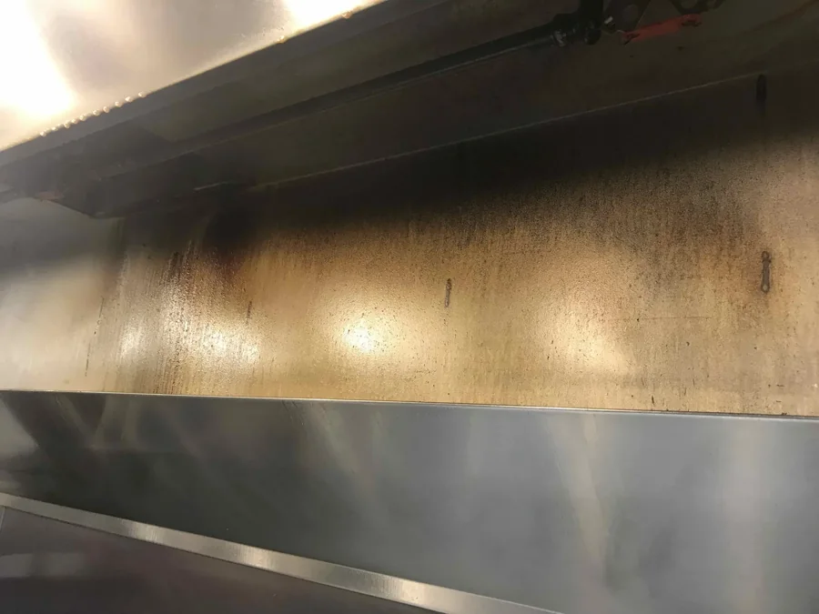 Grease residue on a stainless-steel hood panel